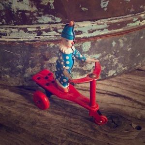 Vintage clown on scooter